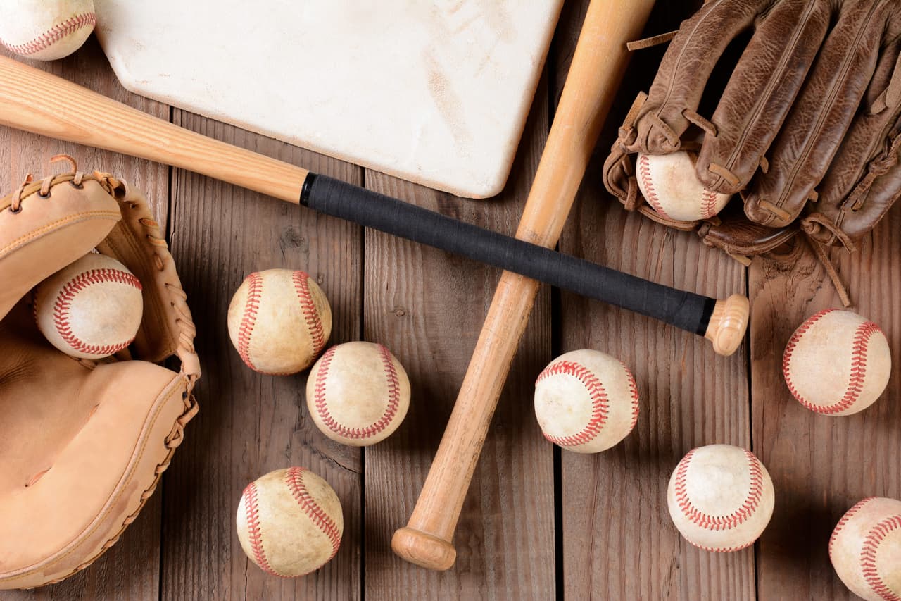 Youth baseball coach working with team