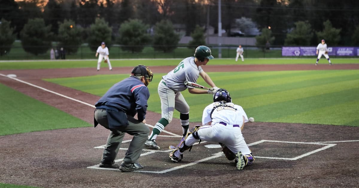 League director planning a youth baseball schedule with calendar and team list