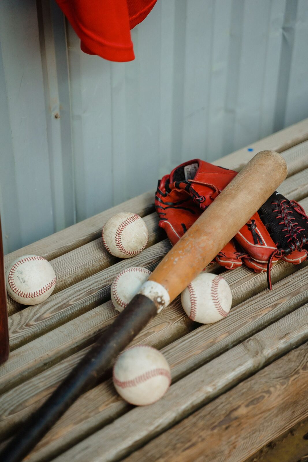 Several baseball bats of different drop weights lined up for a fitting test